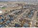 Aerial view of neighborhood, home and nearby Erie Community Center amenities at 1017 Mircos St, Erie, CO 80516