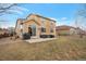 Spacious backyard with a patio area perfect for entertaining and outdoor enjoyment at 1017 Mircos St, Erie, CO 80516