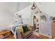 Cozy bedroom with a daybed, hardwood floors, and bright natural light at 2815 Curtis St, Denver, CO 80205