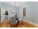 Elegant dining room with hardwood floors and plenty of natural light at 2815 Curtis St, Denver, CO 80205