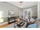 Modern living room featuring neutral decor, hardwood floors, and an open layout at 2815 Curtis St, Denver, CO 80205