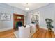 Cozy living room with fireplace, hardwood floors, and ample seating at 2815 Curtis St, Denver, CO 80205