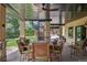 Covered patio with dining area and spiral staircase, offering a great outdoor living space at 81 Falcon Hills Dr, Highlands Ranch, CO 80126