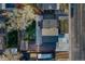 Aerial view showcases the home's layout, including the backyard, patio, and surrounding neighborhood at 6550 W 74Th Pl, Arvada, CO 80003