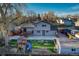 Spacious backyard featuring a deck, play structure, and privacy fence, ideal for Gathering enjoyment at 6550 W 74Th Pl, Arvada, CO 80003