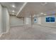 Finished basement featuring neutral colors, recessed lighting, and carpeted floors at 6550 W 74Th Pl, Arvada, CO 80003