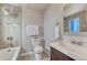 Well-maintained bathroom with a tiled shower, modern fixtures, and a contemporary sink at 6550 W 74Th Pl, Arvada, CO 80003