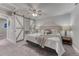 Inviting bedroom with a sliding closet and cozy decor at 6550 W 74Th Pl, Arvada, CO 80003