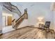Open-concept living room featuring hardwood floors and lots of natural light at 11042 Blackwolf Ln, Parker, CO 80138
