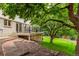 Beautifully landscaped backyard with a stone pathway leading to a large deck at 10227 Osceola Ct, Westminster, CO 80031