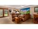 Finished basement featuring a lounge area with sliding glass doors that lead to the backyard at 10227 Osceola Ct, Westminster, CO 80031