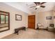 Unfinished basement featuring beige carpet, a window, a large mirror, and a door at 10227 Osceola Ct, Westminster, CO 80031