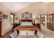 Spacious bedroom with vaulted ceiling, lots of personal touches and an attached seating area at 10227 Osceola Ct, Westminster, CO 80031