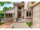 Brick home's entrance features a decorative door with brick pillars at 10227 Osceola Ct, Westminster, CO 80031