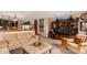 Spacious living room featuring a large entertainment center and comfortable seating at 10227 Osceola Ct, Westminster, CO 80031
