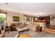 Open living space with comfortable sofas and access to kitchen at 10227 Osceola Ct, Westminster, CO 80031