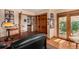 Bright office with wooden floors, storage, and natural light at 10227 Osceola Ct, Westminster, CO 80031