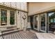 Inviting outdoor patio area with brick accents and access to the home's interior at 10227 Osceola Ct, Westminster, CO 80031