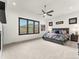 Spacious primary bedroom with large windows and comfortable decor at 5492 Woodroot Pt, Castle Rock, CO 80104