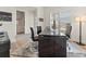 Elegant office space with modern desk, stylish decor, and bright natural light at 5492 Woodroot Pt, Castle Rock, CO 80104