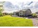 Expansive backyard with lush lawn and a patio at 26722 E Peakview Pl, Aurora, CO 80016