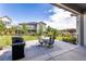 Backyard patio featuring an outdoor kitchen area perfect for al fresco dining and entertaining at 26722 E Peakview Pl, Aurora, CO 80016