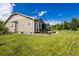 Expansive backyard with lush lawn and a patio at 26722 E Peakview Pl, Aurora, CO 80016