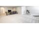 Finished basement with neutral paint, plush carpet, and comfortable leather seating at 26722 E Peakview Pl, Aurora, CO 80016