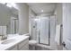 Clean bathroom featuring shower, vanity, and toilet at 26722 E Peakview Pl, Aurora, CO 80016