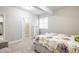Cozy bedroom featuring carpet, neutral walls, and a large closet for ample storage space at 26722 E Peakview Pl, Aurora, CO 80016