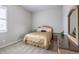 Cozy bedroom with a comfortable bed, plush carpeting, and a window with natural light at 26722 E Peakview Pl, Aurora, CO 80016