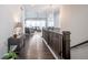 Inviting foyer with hardwood floors leading to the living room, showcasing an open-concept layout at 26722 E Peakview Pl, Aurora, CO 80016