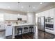 Spacious kitchen with stainless steel appliances, a large island, and ample counter space at 26722 E Peakview Pl, Aurora, CO 80016