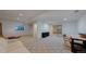 Spacious finished basement with neutral carpet, recessed lighting, and ready for your personalization at 6187 Reed Way, Arvada, CO 80003