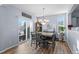 Dining room with sliding door access to backyard patio at 10454 Ouray St, Commerce City, CO 80022