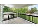 Beautiful upper-level deck overlooking the lush backyard, offering a peaceful outdoor space at 9315 Field Ln, Westminster, CO 80021