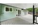 Spacious covered deck with convenient access to both the yard and the interior of the home at 9315 Field Ln, Westminster, CO 80021