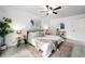 Serene main bedroom with chic furnishings, a comfortable bed, and a soothing ambiance at 9315 Field Ln, Westminster, CO 80021