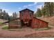 Spacious barn featuring a drive-through stall and a rustic wood exterior at 60 N County Highway 67, Sedalia, CO 80135