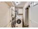 Laundry area with washer and water heater at 1325 Geneva St, Aurora, CO 80010