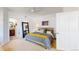 Bedroom featuring neutral decor, carpeted floors, and ample space for relaxation at 4718 Raven Run, Broomfield, CO 80023