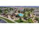 Community pool and clubhouse with mountain views, perfect for outdoor relaxation and recreation at 4718 Raven Run, Broomfield, CO 80023