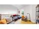 Cozy living room with modern furniture and a large window at 4718 Raven Run, Broomfield, CO 80023