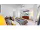 Bright main bedroom with a large window and a neutral color palette at 4718 Raven Run, Broomfield, CO 80023