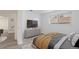 Bedroom featuring a window, decor, new paint, and updated flooring at 7185 S Gaylord St # G13, Littleton, CO 80122