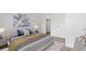 Cozy bedroom features a bed with stylish linens, and adjacent closet at 7185 S Gaylord St # G13, Littleton, CO 80122