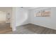 Light and bright bedroom features wood-look vinyl flooring and natural light at 7185 S Gaylord St # G13, Littleton, CO 80122