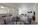 Cozy dining area featuring modern furnishings and sleek finishes, ideal for intimate gatherings at 7185 S Gaylord St # G13, Littleton, CO 80122