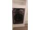 Modern LG washer and dryer combo set in laundry room, ready for convenient in-home cleaning at 7185 S Gaylord St # G13, Littleton, CO 80122