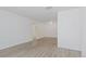 Bright, freshly painted living room featuring modern flooring, ready for your personal touch at 7185 S Gaylord St # G13, Littleton, CO 80122